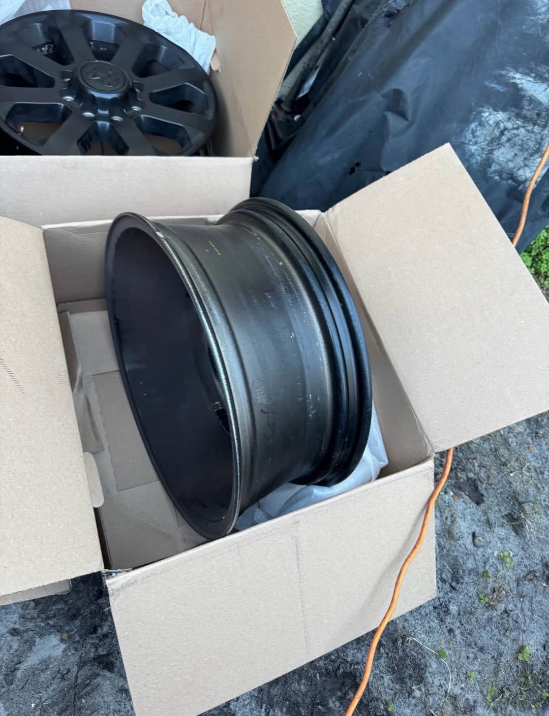 RAM 2500 OEM RIMS WITH BLACK LUG NUTS image 2